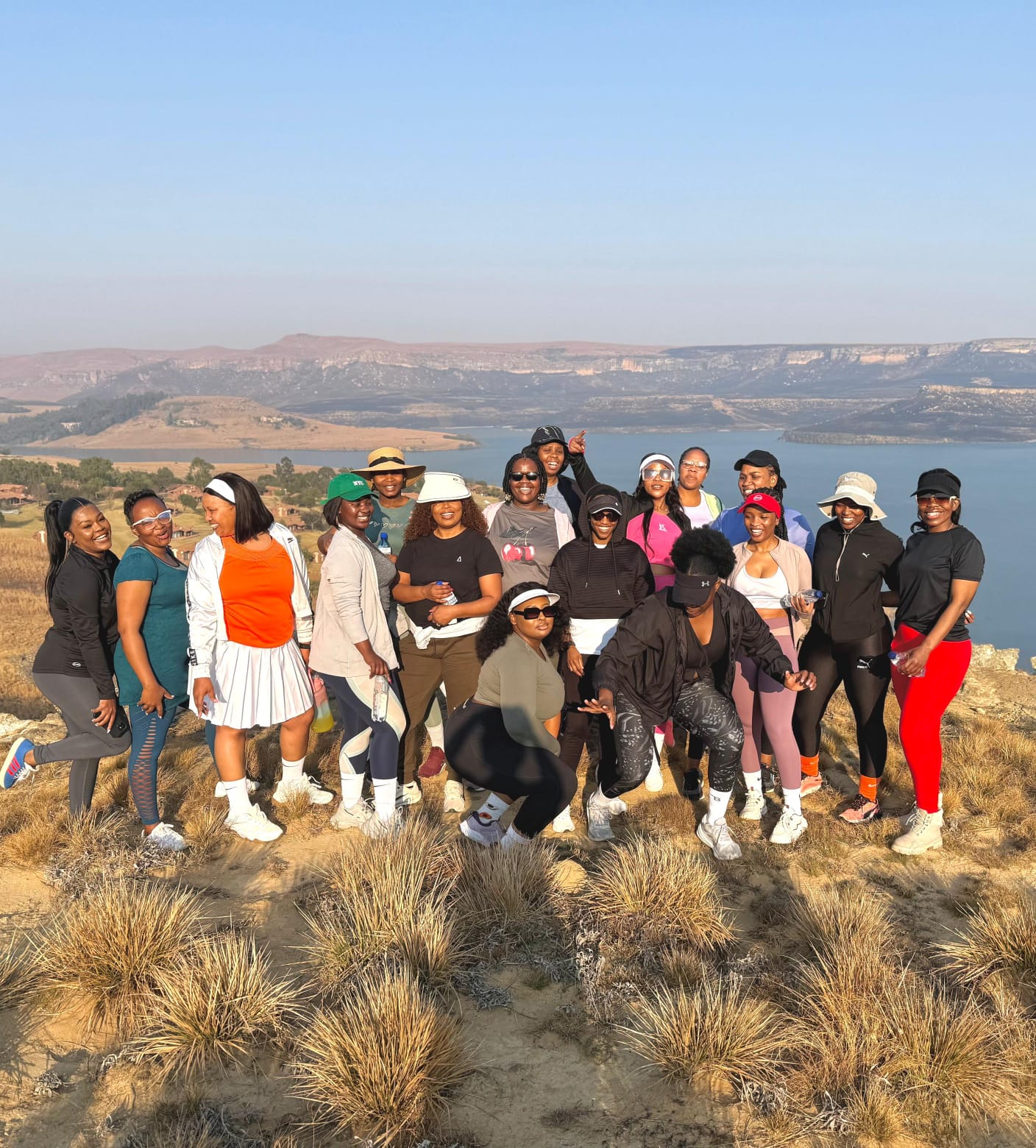 Yuge beside the conference welcome banner